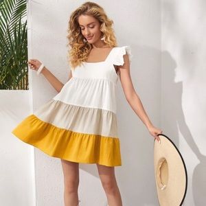 Loose suit with yellow colors